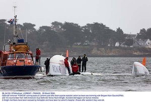 08_04153  ©ThMartinez  LORIENT - FRANCE,  29 March 2008 .
Open 60' trimaran ``FONCIA`` coming back to Lorient's port after boat capsize outside Lorient as boat was trainning with Skipper Alain Gautier(FRA) and 12 crewmember from 34th Amercia's Cup Defender Swiss Team Alinghi. Accident did happen on human mistake. 2 Alinghi members have been rescued by helicopter and have been to Lorient's hospital. 3hours after accident they were ok photo copyright Thierry Martinez http://www.thmartinez.com taken at  and featuring the  class