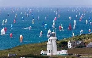 JP Morgan Asset Management Round The Island Race 2009. Fleet approching under spinnaker of St Catherine lighthouse, soutside of Isle of Wight. photo copyright ThMartinez / Sea & Co - Copyright http://www.thmartinez.com taken at  and featuring the  class