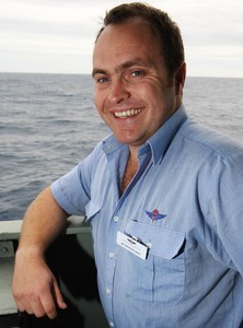 Doctor David McIlroy, Royal Flying Doctors Service,  stands on the starboard bridgewing as HMAS Arunta sails towards the yacht ’Generali’, preparing to render assistance to the injured yachtsman on board. Photography by Able Seaman Photographer Lincoln Commane. photo copyright Commonwealth of Australia taken at  and featuring the  class