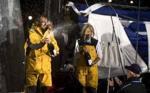 Dominique and Michele spraying Cava after finishing 3rd ©Th.Martinez/Sea and Co/Barcelona World Race photo copyright Barcelona World Race http://www.barcelonaworldrace.org taken at  and featuring the  class