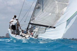 Peter Rogers on &rsquo;Highlife&rsquo; jibes for the downwind run to the finish. photo copyright JOY / IM32CA http://melges32.com/ taken at  and featuring the  class