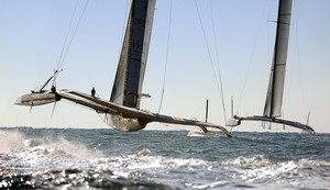 Flying high, on Leg 1, Race 1, 33rd America’s Cup photo copyright Guido Trombetta/Team Alinghi taken at  and featuring the  class
