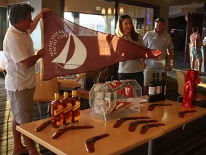 Solo Trans Tasman 2010, presentation of Mooloolaba Yacht Club flag to club member and competitor, Jenny Fitzgibbon photo copyright Tracey Johnstone taken at  and featuring the  class