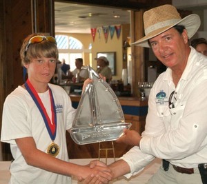 Pensacola Yacht Club Commodore Tim Burr presents the SUBWAY Celebrate Sailing Trophy to Kohl Killeen from New Orleans for top perfotmance in the largest fleet in the SUBWAY 2009 USA JUNIOR OLYMPIC SAILING FESTIVAL.  - USA JUNIOR OLYMPIC SAILING FESTIVAL in Pensacola photo copyright Talbot Wilson taken at  and featuring the  class