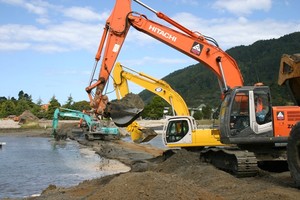 Diggers removing Pauanui bund photo copyright Marsden Cove www.marsdencove.co.nz taken at  and featuring the  class