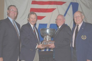 Nathanael G. Herreshoff Trophy (L to R). US Sailing Secretary Fred Hagedorn, US Sailing President Jim Capron, Herreshoff recipient Bob Hobbs, and US Sailing Past President Dave Rosekrans Photo:US Sailing photo copyright Sail-World.com /AUS http://www.sail-world.com taken at  and featuring the  class