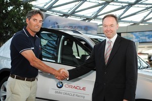 Ian Robertson, (right) Member of the Board of Management BMW Group, Sales & Marketing shakes hands with Russell Coutts, CEO and skipper of BMW Oracle Racing photo copyright BMW Oracle Racing Photo Gilles Martin-Raget http://www.bmworacleracing.com taken at  and featuring the  class