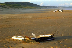 Carbon fibre from Shockwave 5, washed up on Corrimal Beach. photo copyright Peter Andrews http://www.outimage.net taken at  and featuring the  class