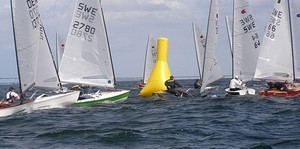 The top mark - 2009 OK dinghy World Championships photo copyright Mary Reddyhoff taken at  and featuring the  class
