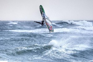 Mussolini one leg back loop - 2009 PWA Colgate World Cup photo copyright  John Carter / PWA http://www.pwaworldtour.com taken at  and featuring the  class