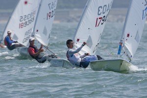 Kenji Nanri of Japan rounding the 1st mark leading the strong fleet. He is the only Japanese who managed to get into Gold fleet photo copyright Kauro Soehata taken at  and featuring the  class