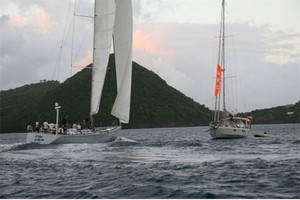 Stay Calm (Swan 70 ) crosses the finish line right in front of the Finish Line boat Chandelle - ARC Atlantic 2009 photo copyright World ARC - http://www.worldcruising.com/arc/ taken at  and featuring the  class