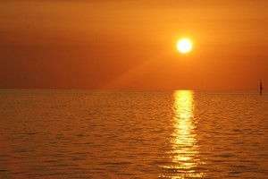 Sun setting in the west in Cuba photo copyright Ian & Andrea Treleaven taken at  and featuring the  class