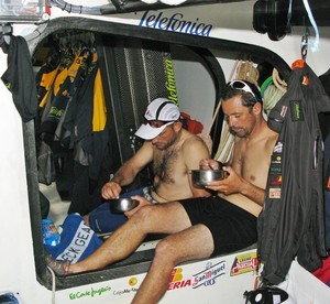 Gabriele Olivo: 
Xabier Fernandez and Jordi Calafat having breackfast after 4 sweatty hours on watch, on leg 2 of the Volvo Ocean Race, from Cape Town, Sout photo copyright Gabriele Olivo/Telefonica Blue/Volvo Ocean Race http://www.volvooceanrace.org taken at  and featuring the  class