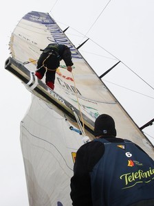 Jordi Calafat up the boom with Pablo Arrarte assisting him, on leg 5 of the Volvo Ocean Race, from Qingdao to Rio de Janeiro photo copyright Gabriele Olivo/Telefonica Blue/Volvo Ocean Race http://www.volvooceanrace.org taken at  and featuring the  class