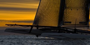 Alinghi 5 enjoys an evening sail in Valencia photo copyright Alinghi Team www.alinghi.com taken at  and featuring the  class