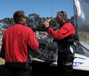 Mike Martin watchs Jeff Nelson swigging Champagne photo copyright Lynn Fitzpatrick taken at  and featuring the  class