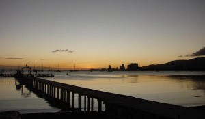 web Juans dinghy wharf at sunset photo copyright BW Media taken at  and featuring the  class