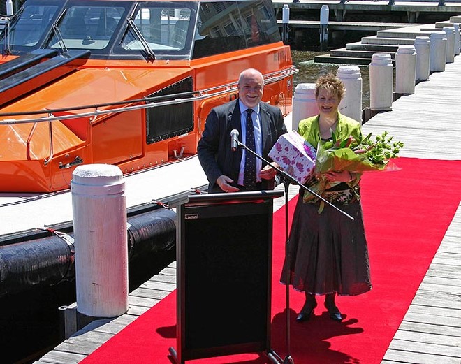Captain Robert Buck presents Ms Karen Needs gifts in appreciation for her christening of Akuna IV. ©  John Curnow