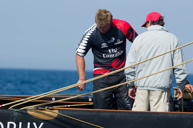 Grinder Winston Mcfarlane points at the markings used by the crew to determin proper back stay tension after the umpires call that cost Emirates Team New Zealand their race against BMW Oracle racing. Louis Vuitton Trophy, La Maddalena, Sardinia, Italy. 28/5/2010 © Chris Cameron/ETNZ http://www.chriscameron.co.nz