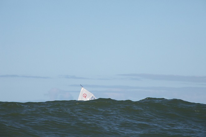 Big seas aptly demonstrated - 2010 NZ Optimist Nationals - Whitianga ©  Will Calver - Ocean Photography http://www.oceanphotography.co.nz/