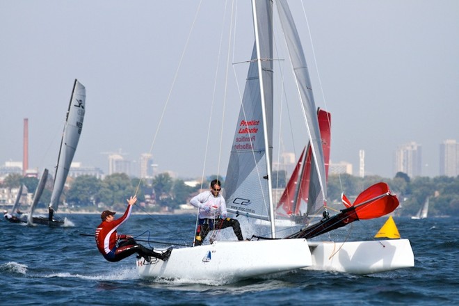 Canadians Chris Prentice and Patrick LaRoche set the spinnaker © Joaquim Santos http://www.eye4photos.ca