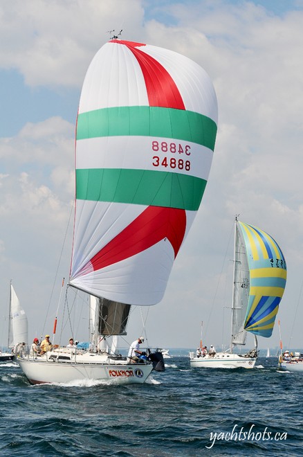 Folichon (foreground), a C&C 34 is skippered by Ian McAllister. A member of Port Credit Yacht Club since 1969 is participating in his 11th consecutive Lake Ontario 300 July 17, 2010. SAIL-WORLD.com/Jeff Chalmers (PORT CREDIT, Ont) - Lake Ontario 300<br />
 © Jeff Chalmers