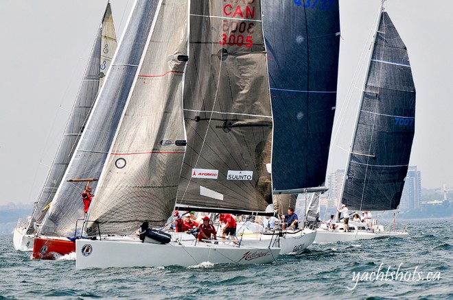 Umi Taka, Gaucho and Notorious approach the line at the start of the Lake Ontario 300 July 17, 2010. SAIL-WORLD.com/Jeff Chalmers (PORT CREDIT, Ont) - Lake Ontario 300 © Jeff Chalmers