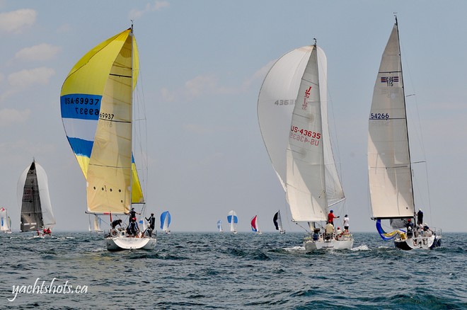 Lake Ontario 300 competitors fly their respective kites at the start of the race. SAIL-WORLD.com/Jeff Chalmers (PORT CREDIT, Ont) - Lake Ontario 300 © Jeff Chalmers