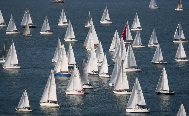 The fleet of 1,754 boats round the Needles on the Isle of Wight during the J.P. Morgan Asset Management Round the Island Race. © onEdition http://www.onEdition.com