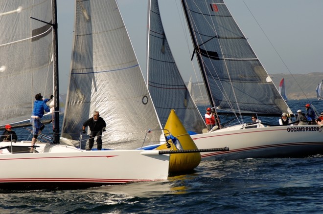 The Flying Tiger fleet rounds the windward mark - San Diego Yachting Cup 2010 © David J. Shuler