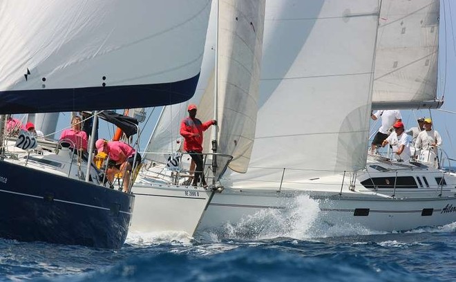 Tight fleet racing is the norm at the 2010 Antigua Sailing Week ©  Tim Wright / Photoaction.com http://www.photoaction.com