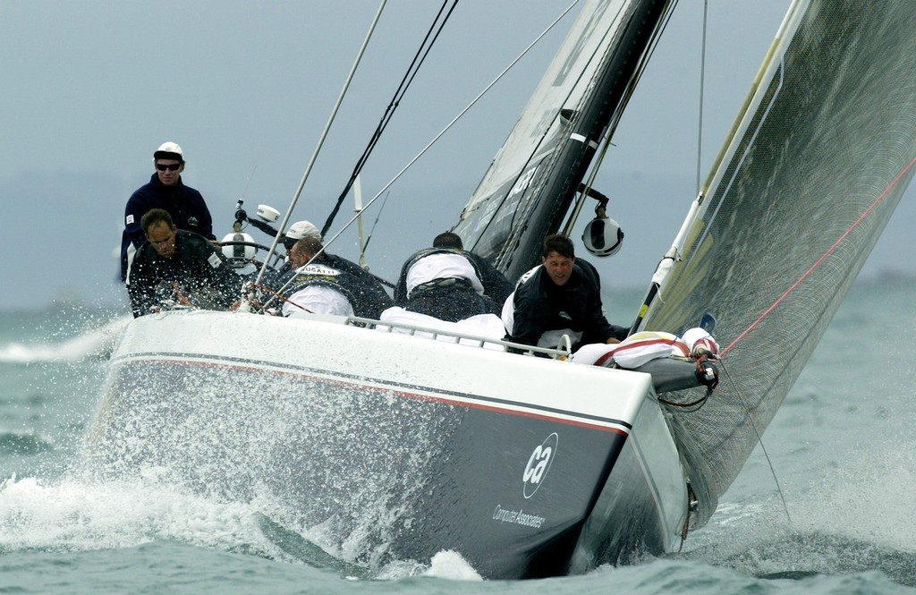 Team Dennis Conner’s Stars & Stripes head for the top mark. Louis Vuitton Cup, Quarter finals. Auckland, New Zealand. Nov, 16. 2002  (Photo credit: Sergio Dionisio/Oceanfashion Pictures) © SW