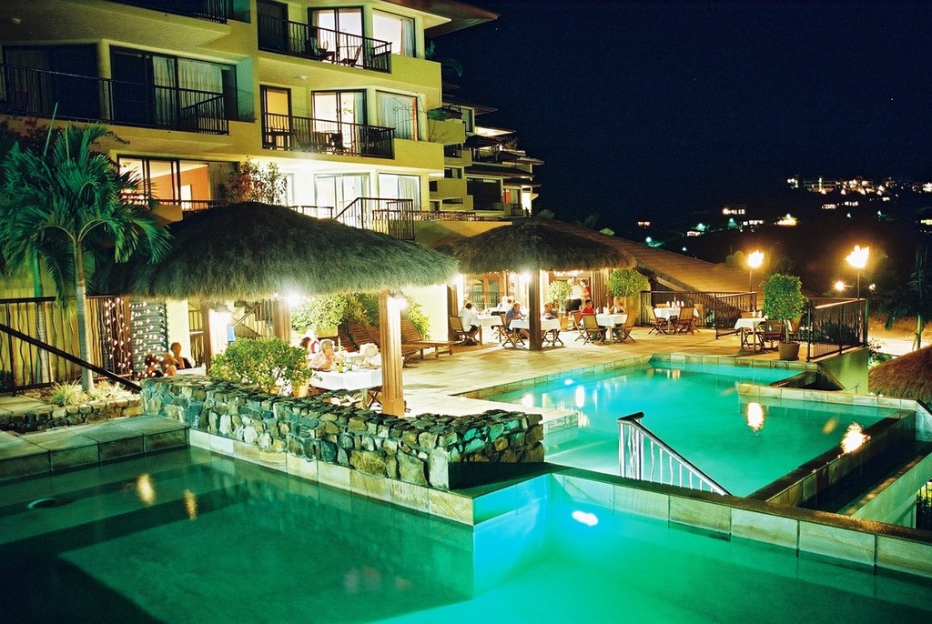 Waters Edge Resort Exterior Night photo copyright yacht photography.com taken at  and featuring the  class