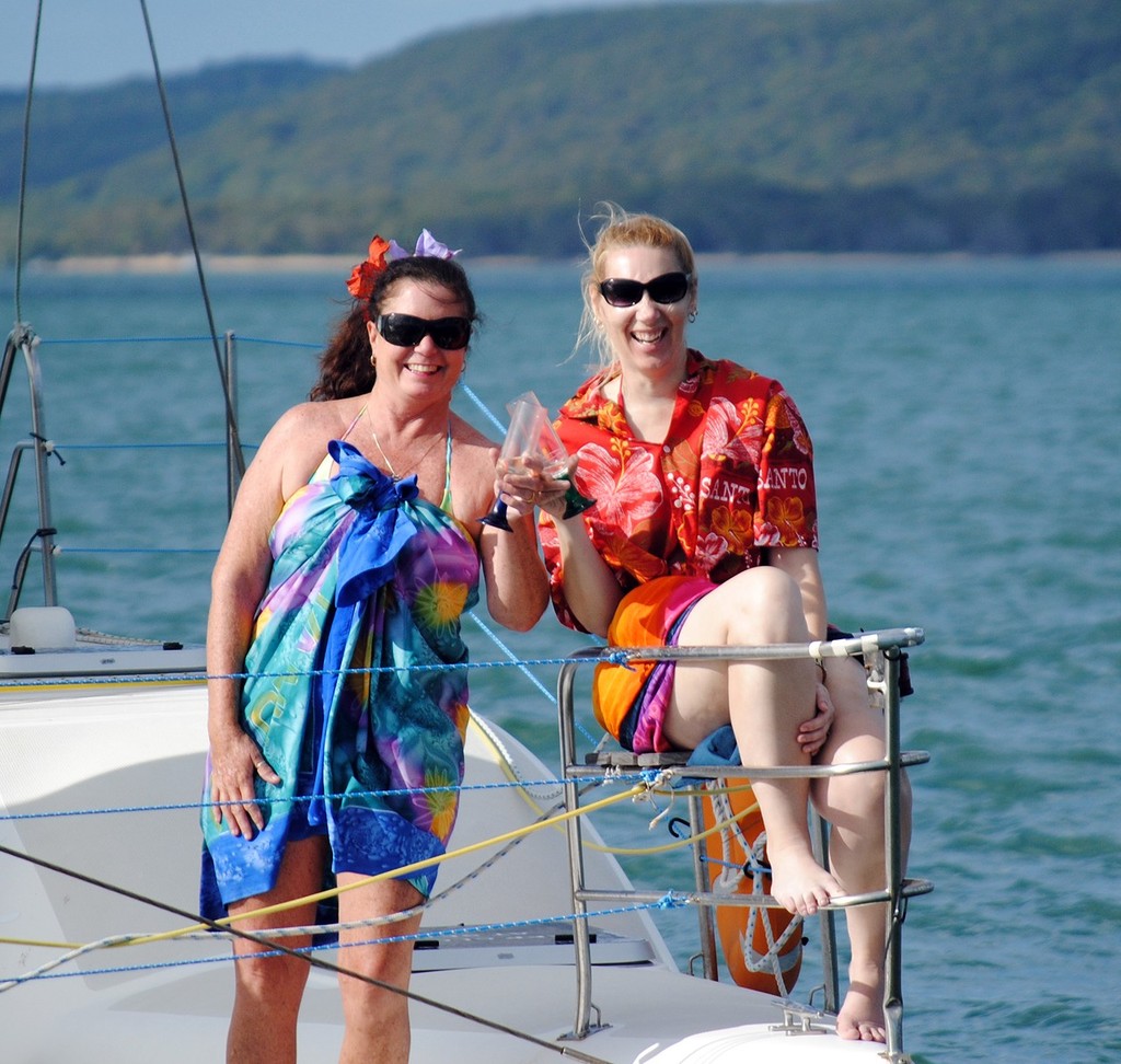 The crew on board Sunbird celebrating the weather. - Seawind Moreton Bay regatta photo copyright Imprint Media taken at  and featuring the  class