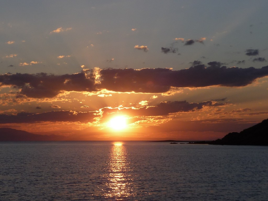 Sunset photo copyright Sandra Clark taken at  and featuring the  class