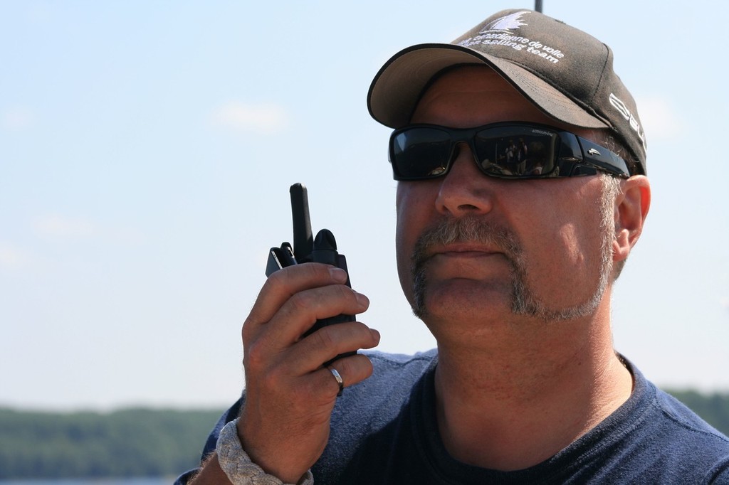 Larry Woolner, President, Sail Parry Sound, confers with race committee re: start line. - Big Sound Challenge © Elizabeth A Kerr