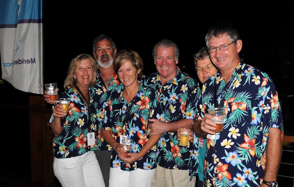 It doesn’t get much more tropical than frangipani and Murray Sheer’s crew on Benetta elected to wear shirts featuring the magnificent flower. Here crew members Murray, wife Julie; along with Tim and Tori Cormack, Charlie and Betty Preen enjoy a drink and a laugh in the Race Week Marquee. © John Daffy - BluePRINT Public Relations