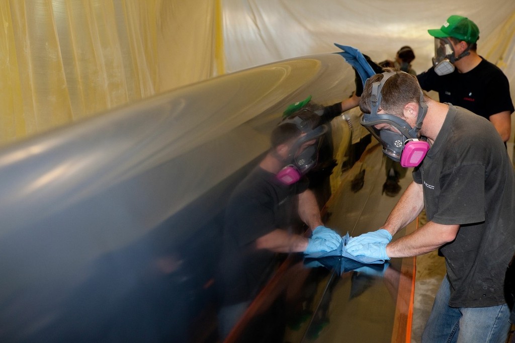 Polishing the male mould - AC 45 Warkworth - 20 October 2010 &copy; Ivor Wilkins/www.americascup.com www.americascup.com