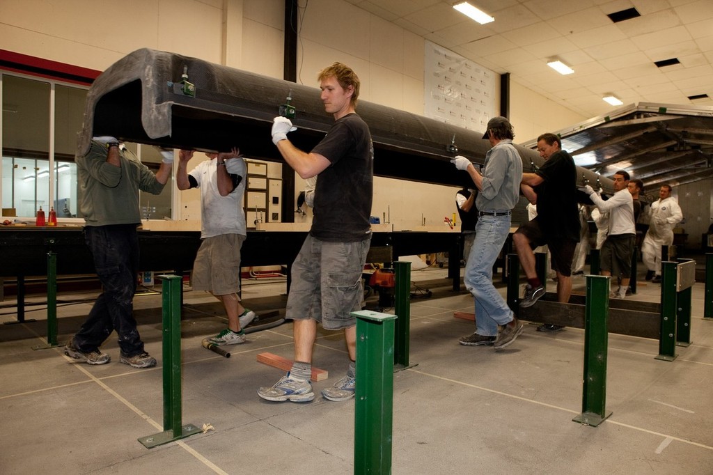 An AC45 female mould is carried by the building team At Core Composites photo copyright Ivor Wilkins/www.americascup.com www.americascup.com taken at  and featuring the  class