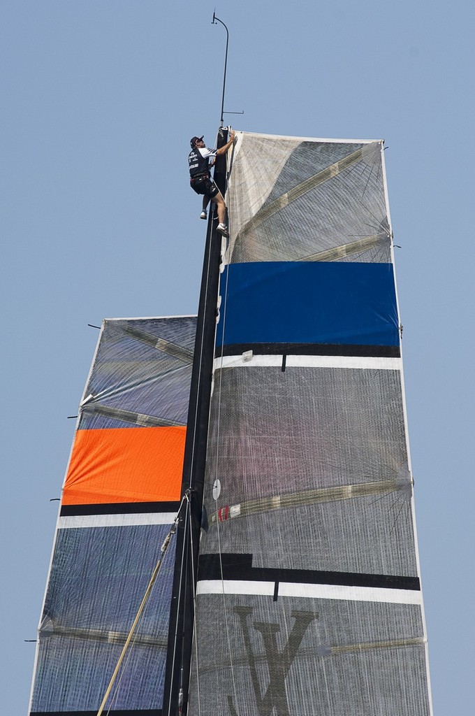 Emirates Team New Zealand’s Adam Beashal ensures the main is locked on before their first race of the regatta. Unfortunately the wind died out and racing was abanfoned. Day two of the Louis Vuitton Trophy, La Maddalena. Sardinia, Italy. 23/5/2010 © Chris Cameron/ETNZ http://www.chriscameron.co.nz
