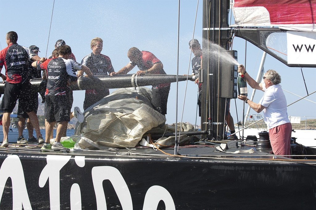 Bruno Trouble sprays Emirates Team New Zealand with Moet and Chandon after the teams 3 - 2 win over Synergy (RUS) in the finals. Louis Vuitton Trophy. La Maddalena, Sardinia, Italy. 6/6/2010 © Chris Cameron/ETNZ http://www.chriscameron.co.nz