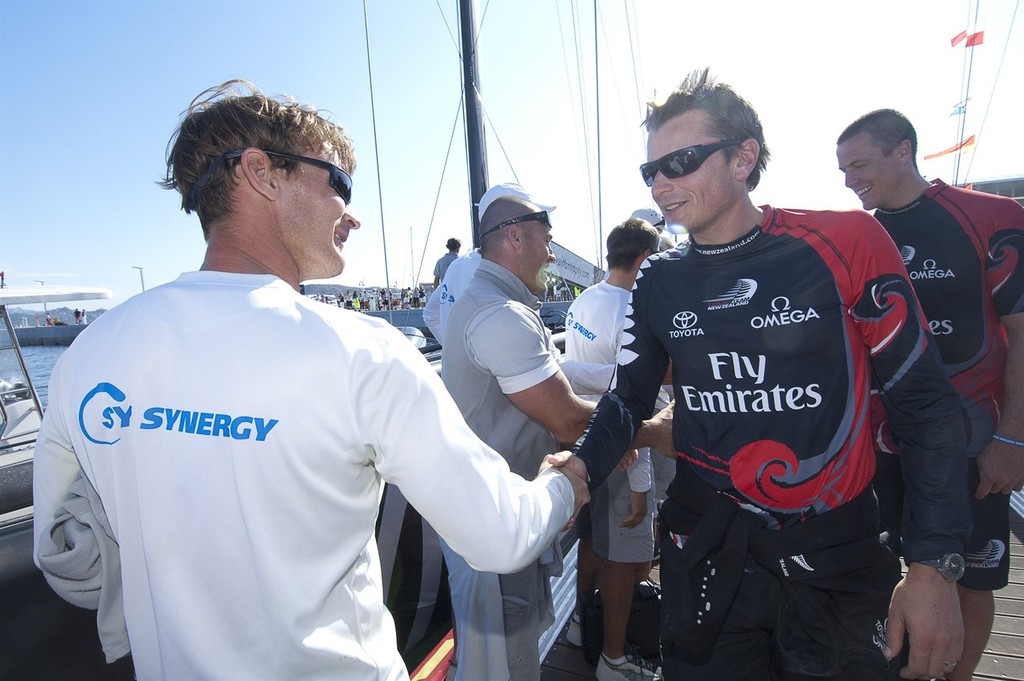 Emirates Team New Zealand helmsman Dean Barker is greeted on the dock by Synergy sailors after the teams 3 - 2 win over Synergy (RUS) in the finals. © Chris Cameron/ETNZ http://www.chriscameron.co.nz