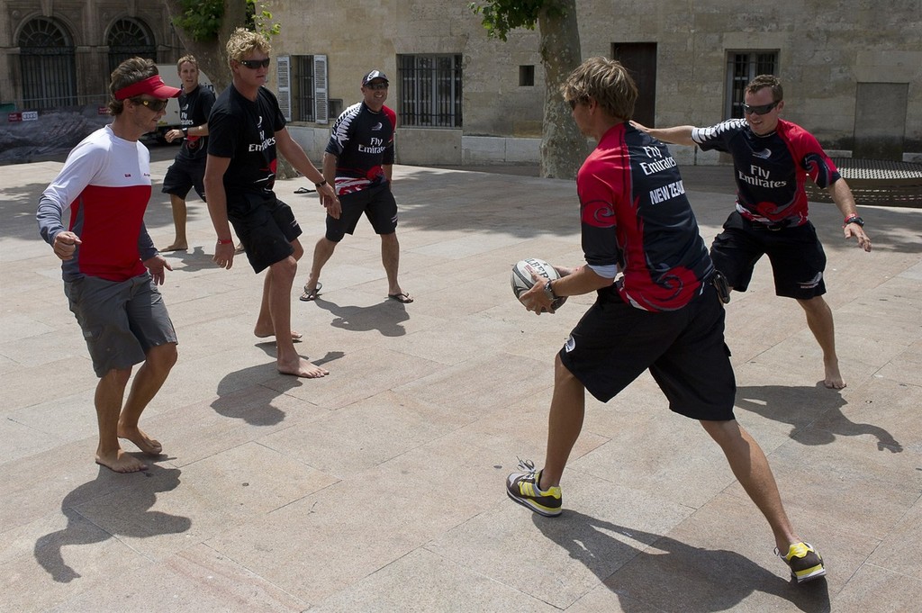 Emirates Team New Zealand shorecrew play touch rugby during the  postponement while the race comitee wait to see if the strong winds will subside sufficiently to race. Audi MedCup Marseille, France. 19/6/2010 © Chris Cameron/ETNZ http://www.chriscameron.co.nz