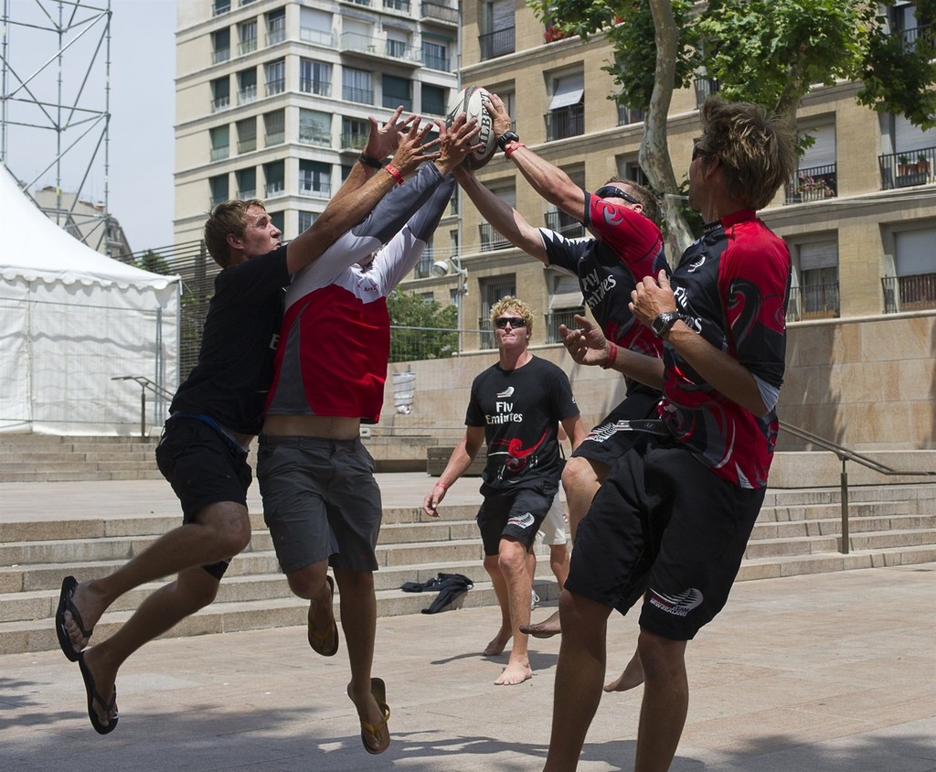 Emirates Team New Zealand shorecrew play touch rugby during the  postponement while the race comitee wait to see if the strong winds will subside sufficiently to race. Audi MedCup Marseille, France. 19/6/2010 © Chris Cameron/ETNZ http://www.chriscameron.co.nz
