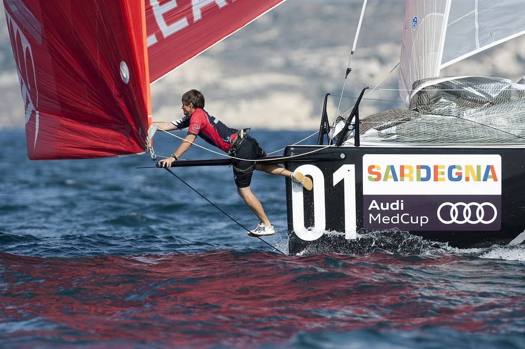 Emirates Team New Zealand bowman Richard Meacham retreives the string line. Race two on Day one of the Trophy of Sardinia, Audi MedCup 2010. 21/9/2010 © Chris Cameron/ETNZ http://www.chriscameron.co.nz