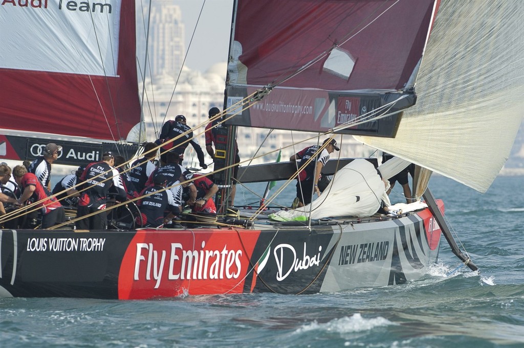 Emirates Team New Zealand retrieve their splintered spinnaker pole. Gavin Brady gets a double penalty for Mascalzone Latino (ITA) in this collision in race two. Day one of the Louis Vuitton Dubai regatta. 14/11/2010 &copy; Chris Cameron/ETNZ http://www.chriscameron.co.nz