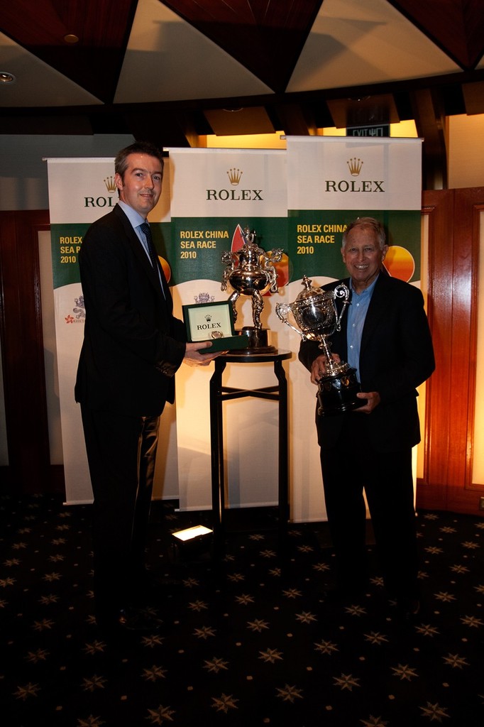 Andrew Herne (Rolex Hong Kong) presents Neil Pryde (right) with the lion's share of the silverware after the Rolex China Sea Race 2010. photo copyright  RHKYC/Guy Nowell http://www.guynowell.com/ taken at  and featuring the  class
