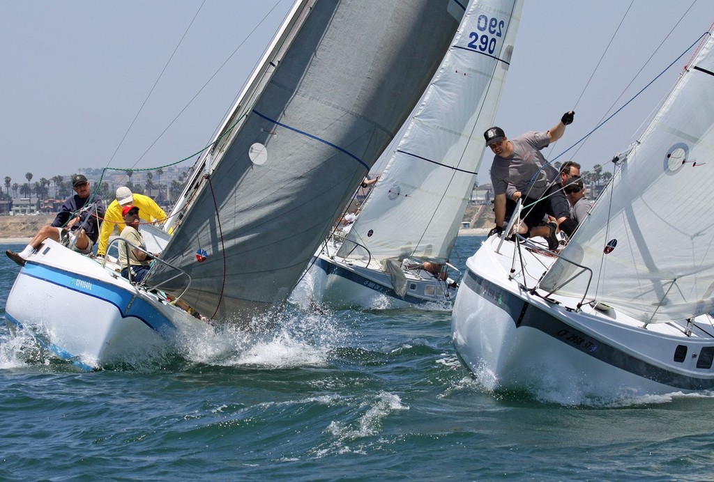 Don Reiman’s “Rhyme N Reason (l) and Felix Basadre and Rick Sottile’s “Tiburon (r) battle for room at the mark during the  2010 Cal 25 Regional Championship. - 2010 Cal 25 Regional Championship  © Rick Roberts 