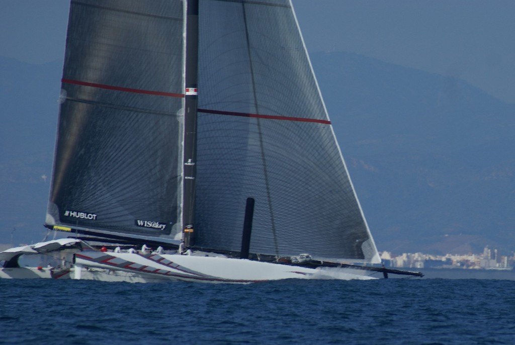 Alinghi buries her bows into a big swell three hours before the start of Race 2 © Richard Gladwell www.photosport.co.nz